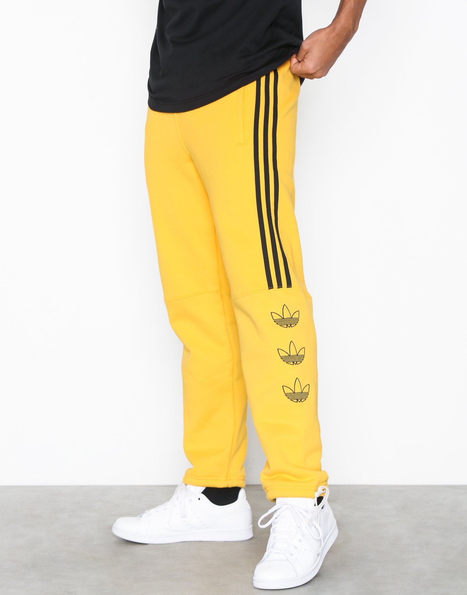 white and gold sweatpants